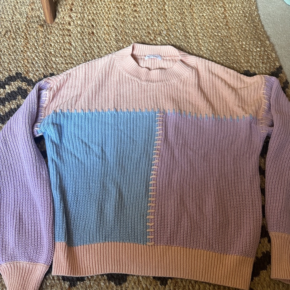 Vestique sweater